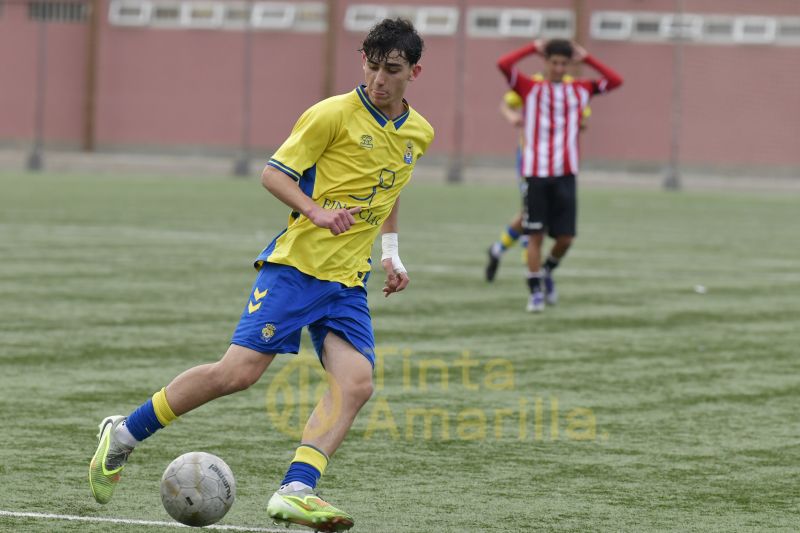 Fotos: El juvenil C de la UD ya tiene a tiro el título de su Liga